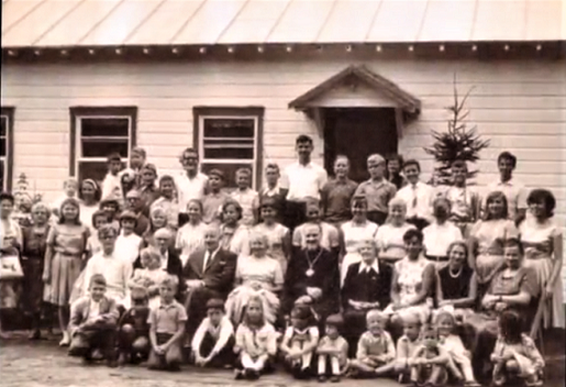 Acrchbishop with parisioners 1960s CBCS.png