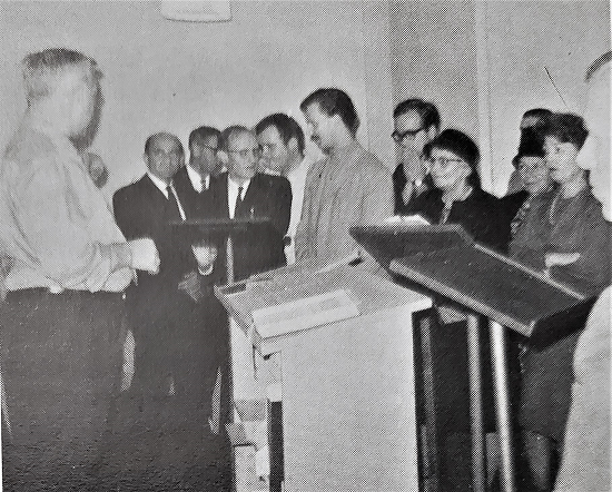 Alexander A Kaminski directs the choir 1.png
