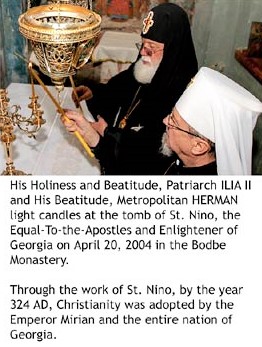 Lighting a candle at Saint Nino's tomb 1.jpg