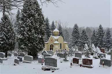 Saint Tikhon Monastery Cemetery looking eastwardsCBCS.png