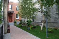 Entrance to the newer building via the garden.jpg